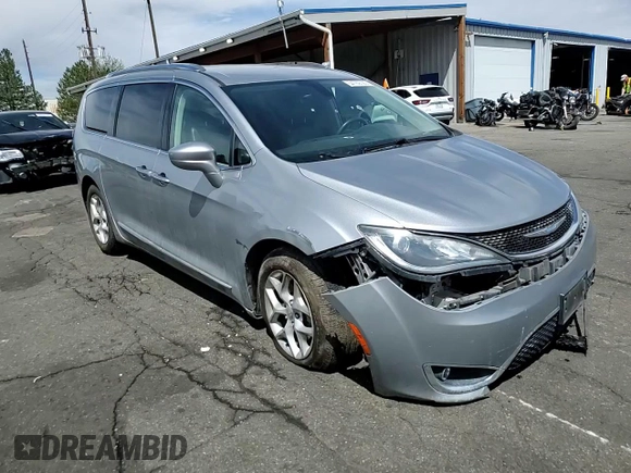 2018 Chrysler Pacifica Touring L z VIN 2C4RC1BG7JR311964, wystawiony jako Copart lot #54769725 z przebiegiem 105 062 mil mil oraz Szkoda całkowita • Salvage title. Historia ofert i sprzedaży dostępna na DreamBid. Obrazek 14.