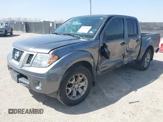 2021 Nissan Frontier SV with VIN 1N6ED0EA9MN707972, listed as a IAAI auction lot 41823460 with 71,085 mi miles and . Bid and sale history available at DreamBid. Image 2.