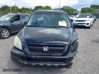 2005 Honda Pilot EX-L with NAVI with VIN 2HKYF18715H562492, listed as a IAAI auction lot 41627194 with 184,653 mi miles. Bid and sale history available at carsss.com. Image 12.