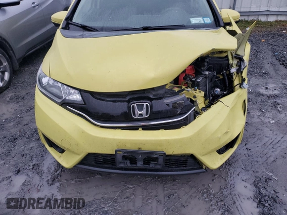 2015 Honda Fit EX with VIN 3HGGK5G80FM769753, listed as a Copart auction lot 82229354 with 101,079 mi miles and Salvage title. Bid and sale history available at DreamBid. Image 12.