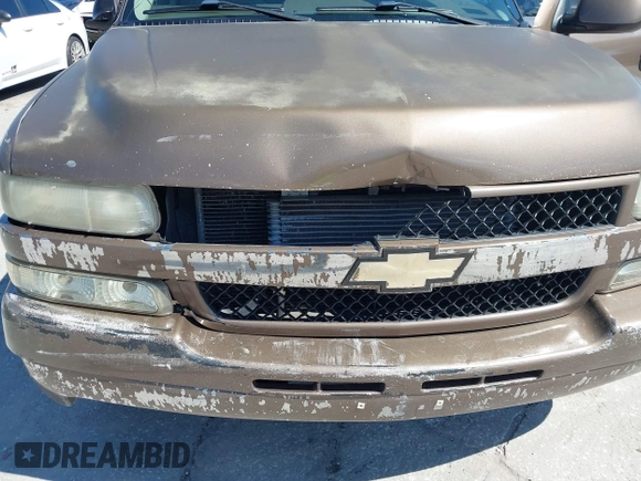2004 Chevrolet Suburban LT z VIN 1GNEC16Z84J186242, wystawiony jako IAAI lot #41650162 z przebiegiem 268 767 mil mil oraz . Historia ofert i sprzedaży dostępna na DreamBid. Obrazek 6.