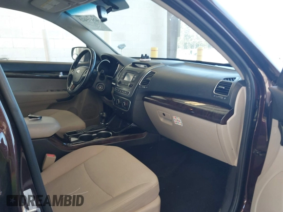 2014 Kia Sorento LX with VIN 5XYKT4A61EG435606, listed as a IAAI auction lot 42075423 with 112,474 mi miles and . Bid and sale history available at DreamBid. Image 5.