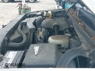 2003 Chevrolet Suburban LT z VIN 1GNFK16Z13J199808, wystawiony jako IAAI lot #42404012 z przebiegiem 242 232 mil mil oraz . Historia ofert i sprzedaży dostępna na DreamBid. Obrazek 19.