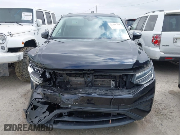 2022 Volkswagen Tiguan SE with VIN 3VV3B7AX3NM016534, listed as a IAAI auction lot 42354264 with 33,700 mi miles and . Bid and sale history available at DreamBid. Image 12.