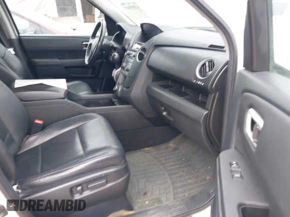 2014 Honda Pilot Touring with VIN 5FNYF4H91EB041614, listed as a IAAI auction lot 42050405 with 158,236 mi miles and . Bid and sale history available at DreamBid. Image 5.