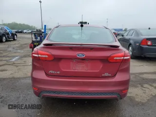 2016 Ford Focus SE with VIN 1FADP3F29GL371860, listed as a Copart auction lot 57687795 with 77,269 mi miles and Clean title. Bid and sale history available at DreamBid. Image 6.