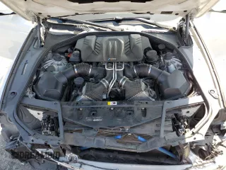2014 BMW M5 with VIN WBSFV9C57ED097570, listed as a Copart auction lot 69757854 with 0 mi miles and Salvage Title. Bid and sale history available at carsss.com. Image 11.