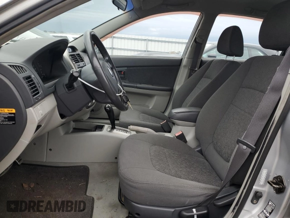 2005 Kia Spectra with VIN KNAFE161055128022, listed as a Copart auction lot 85615204 with 105,444 mi miles and Clean Title. Bid and sale history available at DreamBid. Image 7.