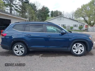 2021 Volkswagen Atlas SE z VIN 1V2JR2CA9MC547054, wystawiony jako IAAI lot #42090923 z przebiegiem 40 011 mil mil oraz . Historia ofert i sprzedaży dostępna na DreamBid. Obrazek 14.