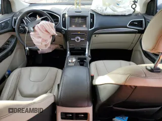 2019 Ford Edge Titanium with VIN 2FMPK4K96KBB80142, listed as a Copart auction lot 84847814 with 75,602 mi miles and Salvage title. Bid and sale history available at DreamBid. Image 8.