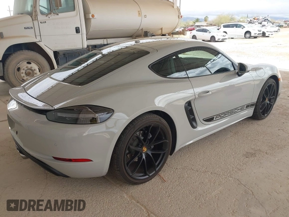 2024 Porsche 718 Cayman with VIN WP0AA2A83RK255017, listed as a IAAI auction lot 41745890 with 15,429 mi miles and . Bid and sale history available at DreamBid. Image 4.