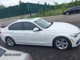 2018 BMW 3 Series 330i xDrive with VIN WBA8D9C52JEM32318, listed as a IAAI auction lot 42309352 with 61,828 mi miles and . Bid and sale history available at DreamBid. Image 13.