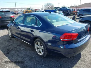 2013 Volkswagen Passat SE w/Sunroof & Nav with VIN 1VWBP7A30DC074235, listed as a IAAI auction lot 41967875 with 153,803 mi miles. Bid and sale history available at carsss.com. Image 3.