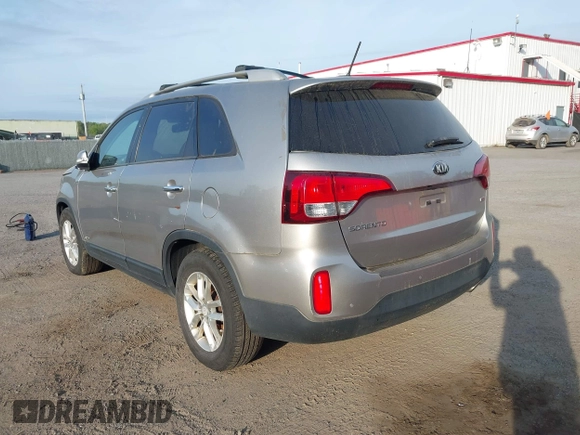 2014 Kia Sorento LX with VIN 5XYKTDA67EG489525, listed as a IAAI auction lot 42121940 with 180,281 mi miles. Bid and sale history available at carsss.com. Image 3.