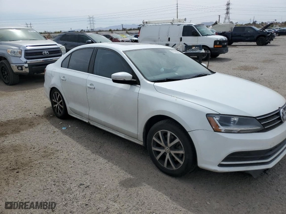2017 Volkswagen Jetta 1.4T SE with VIN 3VWDB7AJ6HM304533, listed as a Copart auction lot 51318645 with 99,703 mi miles and Salvage Title. Bid and sale history available at carsss.com. Image 4.