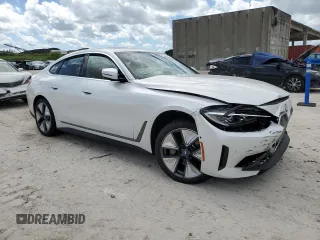 2023 BMW i4 eDrive40 z VIN WBY73AW02PFP79569, wystawiony jako Copart lot #70741883 z przebiegiem 9 396 mil mil oraz . Historia ofert i sprzedaży dostępna na DreamBid. Obrazek 4.