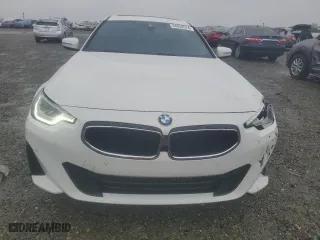 2024 BMW 2 Series 230i with VIN 3MW23CM00R8D85281, listed as a Copart auction lot 84020574 with 10,715 mi miles and Salvage Title. Bid and sale history available at carsss.com. Image 5.