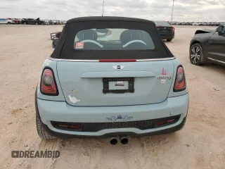 2014 MINI Convertible S with VIN WMWZP3C56ET707425, listed as a Copart auction lot 50894965 with 100,116 mi miles and Salvage Title. Bid and sale history available at DreamBid. Image 6.