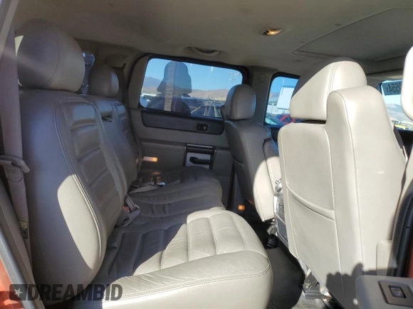 2003 Hummer H2 with VIN 5GRGN23U33H125797, listed as a Copart auction lot 77170554 with 166,739 mi miles and Clean Title. Bid and sale history available at carsss.com. Image 11.