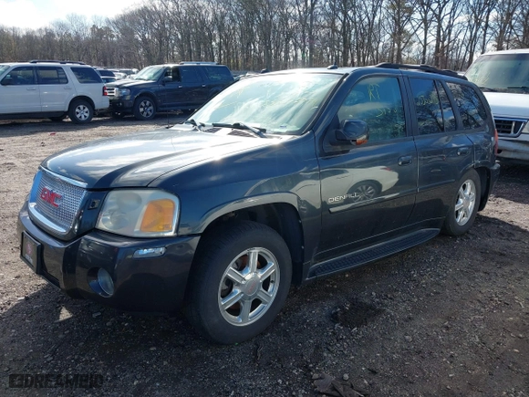 2005 GMC Envoy Denali with VIN 1GKET63M052336214, listed as a IAAI auction lot 41852417 with 999,999 mi miles. Bid and sale history available at carsss.com. Image 2.