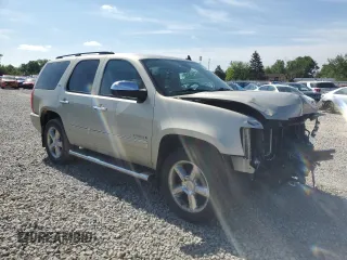 2014 Chevrolet Tahoe LTZ with VIN 1GNSKCE03ER201981, listed as a Copart auction lot 56421125 with 173,710 mi miles and Salvage title. Bid and sale history available at DreamBid. Image 4.