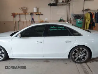 2013 Audi S8 z VIN WAUD2AFD7DN008887, wystawiony jako IAAI lot #42314337 z przebiegiem 155 978 mil mil oraz . Historia ofert i sprzedaży dostępna na DreamBid. Obrazek 14.
