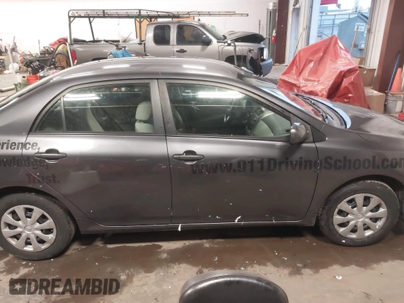 2011 Toyota Corolla L with VIN JTDBU4EEXB9164587, listed as a IAAI auction lot 41148098 with 154,527 mi miles and . Bid and sale history available at DreamBid. Image 13.