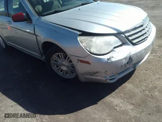 2008 Chrysler Sebring Touring with VIN 1C3LC56K78N275328, listed as a IAAI auction lot 41811526 with 195,457 mi miles. Bid and sale history available at carsss.com. Image 6.