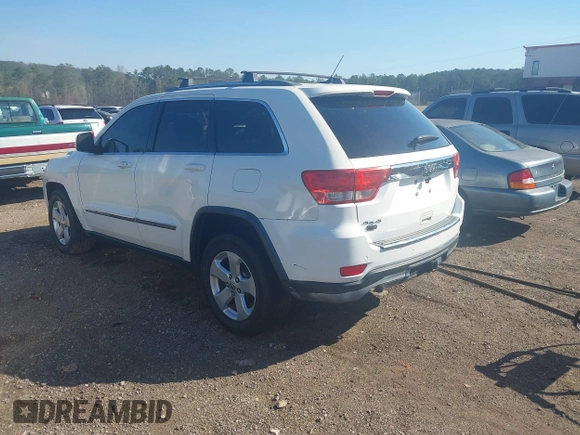 2012 Jeep Grand Cherokee Laredo with VIN 1C4RJEAG5CC106203, listed as a IAAI auction lot 41821138 with 157,474 mi miles. Bid and sale history available at carsss.com. Image 3.