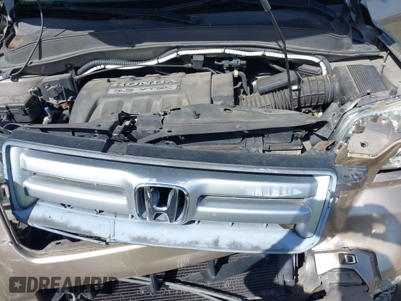 2006 Honda Pilot EX-L with VIN 2HKYF18566H561371, listed as a IAAI auction lot 41950296 with 145,579 mi miles and . Bid and sale history available at DreamBid. Image 10.