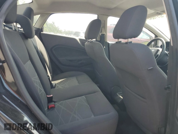 2015 Ford Fiesta S z VIN 3FADP4AJ2FM122902, wystawiony jako Copart lot #57916245 z przebiegiem 126 535 mil mil oraz Czysty tytuł • Clean title. Historia ofert i sprzedaży dostępna na DreamBid. Obrazek 10.