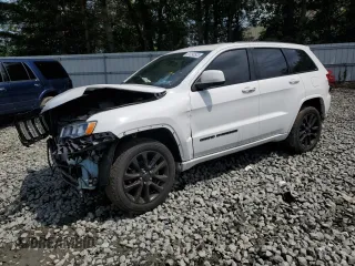2018 Jeep Grand Cherokee Altitude with VIN 1C4RJFAGXJC122688, listed as a Copart auction lot 61290525 with 106,671 mi miles and Salvage title. Bid and sale history available at DreamBid. Image 1.