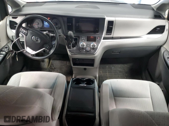 2016 Toyota Sienna LE with VIN 5TDJK3DC2GS129739, listed as a Copart auction lot 86125854 with 74,058 mi miles and Salvage Title. Bid and sale history available at carsss.com. Image 8.