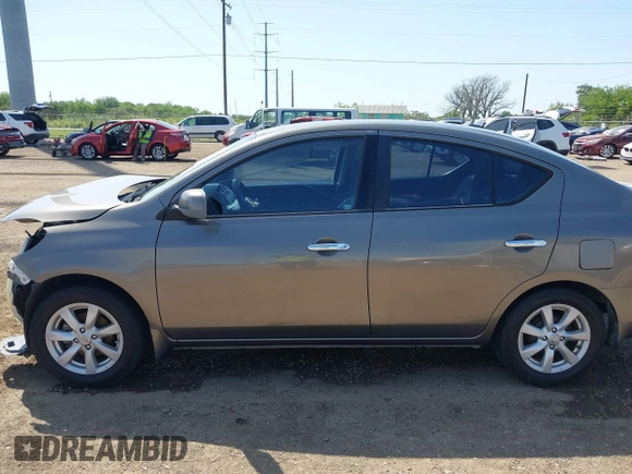 2012 Nissan Versa SV with VIN 3N1CN7AP8CL906636, listed as a IAAI auction lot 42007827 with 111,627 mi miles. Bid and sale history available at carsss.com. Image 15.