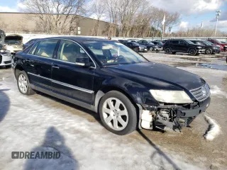 2004 Volkswagen Phaeton V8 z VIN WVWAF63D048011494, wystawiony jako Copart lot #43921145 z przebiegiem 129 758 mil mil oraz Tytuł czysty. Historia ofert i sprzedaży dostępna na DreamBid. Obrazek 4.