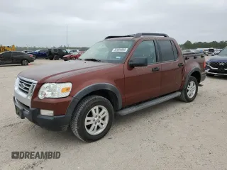 2010 Ford Explorer Sport Trac XLT z VIN 1FMEU3BE2AUF07380, wystawiony jako Copart lot #52099905 z przebiegiem 149 856 mil mil oraz Szkody całkowita. Historia ofert i sprzedaży dostępna na DreamBid. Obrazek 1.