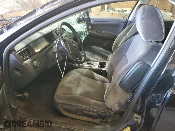2014 Chevrolet Impala LS with VIN 2G1WA5E38E1185801, listed as a Copart auction lot 72343864 with Not Provided miles and Salvage Title. Bid and sale history available at DreamBid. Image 7.