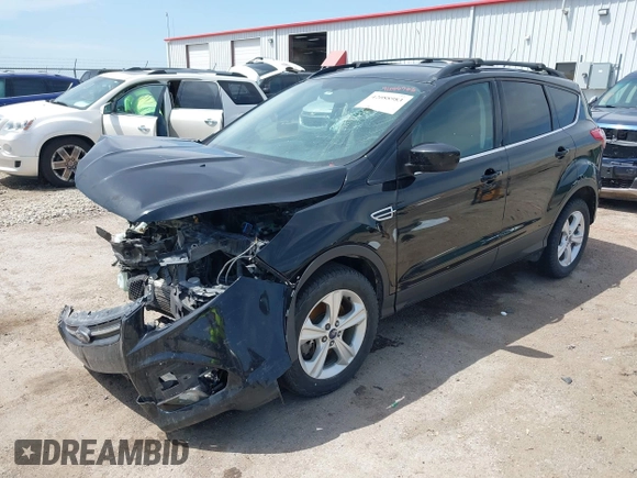 2016 Ford Escape SE z VIN 1FMCU9G97GUA77456, wystawiony jako IAAI lot #42088983 z przebiegiem 160 718 mil mil oraz . Historia ofert i sprzedaży dostępna na DreamBid. Obrazek 2.