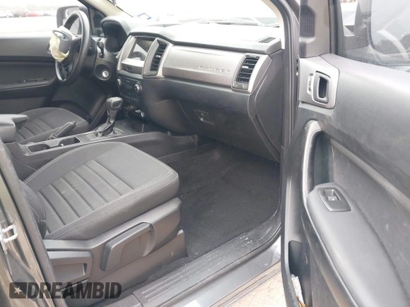 2023 Ford Ranger XL with VIN 1FTER4EH3PLE34388, listed as a IAAI auction lot 41649813 with 14,977 mi miles and . Bid and sale history available at DreamBid. Image 5.