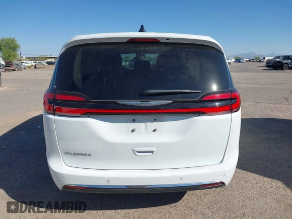 2023 Chrysler Pacifica Touring L with VIN 2C4RC1BG6PR531640, listed as a IAAI auction lot 42251680 with 31,638 mi miles and . Bid and sale history available at DreamBid. Image 16.