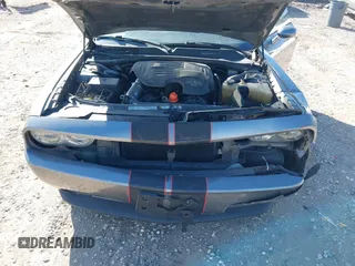 2011 Dodge Challenger z VIN 2B3CJ4DG3BH512974, wystawiony jako IAAI lot #41431931 z przebiegiem 186 845 mil mil oraz . Historia ofert i sprzedaży dostępna na DreamBid. Obrazek 10.
