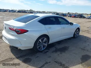 2023 Acura TLX w/Advance Package with VIN 19UUB6F65PA003881, listed as a IAAI auction lot 41360237 with 12,905 mi miles. Bid and sale history available at carsss.com. Image 4.