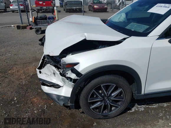 2018 Mazda CX-5 Grand Touring with VIN JM3KFBDM0J0404635, listed as a IAAI auction lot 41883068 with 71,178 mi miles. Bid and sale history available at carsss.com. Image 17.