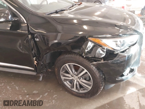 2020 Infiniti QX60 Pure with VIN 5N1DL0MN3LC533814, listed as a IAAI auction lot 41077349 with 79,377 mi miles and . Bid and sale history available at DreamBid. Image 6.