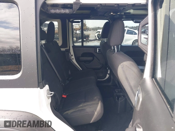 2023 Jeep Wrangler Sport S with VIN 1C4HJXDN9PW540842, listed as a IAAI auction lot 41712336 with 36,017 mi miles and . Bid and sale history available at DreamBid. Image 8.
