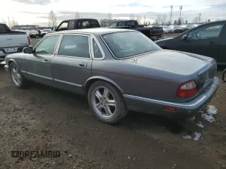 2002 Jaguar XJ with VIN SAJFA12C72LF47096, listed as a Copart auction lot 79412794 with 287,060 mi miles and Clean Title. Bid and sale history available at DreamBid. Image 2.