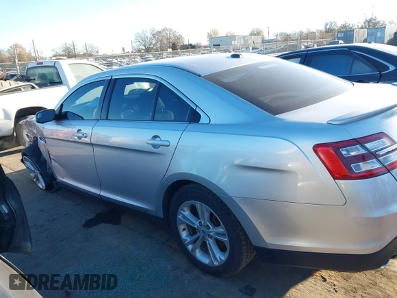 2014 Ford Taurus SEL z VIN 1FAHP2E87EG121069, wystawiony jako IAAI lot #41030422 z przebiegiem 138 043 mil mil oraz . Historia ofert i sprzedaży dostępna na DreamBid. Obrazek 14.