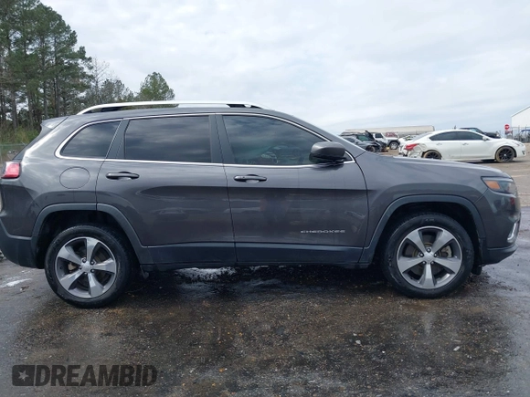 2020 Jeep Cherokee Limited with VIN 1C4PJLDN0LD552064, listed as a IAAI auction lot 41567994 with 74,816 mi miles. Bid and sale history available at carsss.com. Image 14.