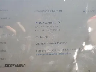 2022 Tesla Model Y Long Range z VIN 7SAYGAEE4NF543503, wystawiony jako Copart lot #47143155 z przebiegiem 53 874 mil mil oraz Szkody całkowita. Historia ofert i sprzedaży dostępna na DreamBid. Obrazek 9.