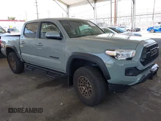 2022 Toyota Tacoma SR with VIN 3TMCZ5ANXNM479025, listed as a IAAI auction lot 42280363 with 29,650 mi miles and . Bid and sale history available at DreamBid. Image 1.